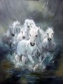 caballos blancos corriendo en el agua